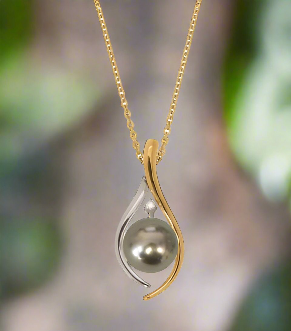 Black South Sea Pearl on an 18K Yellow and White Gold Fitting